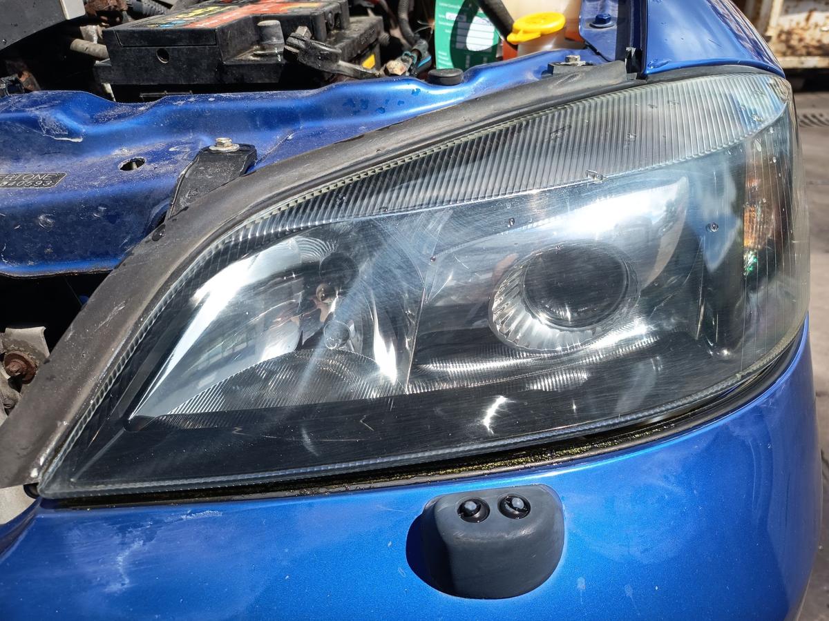 Opel Astra G Coupe original Hauptscheinwerfer links Xenon Front Licht Bj 2002