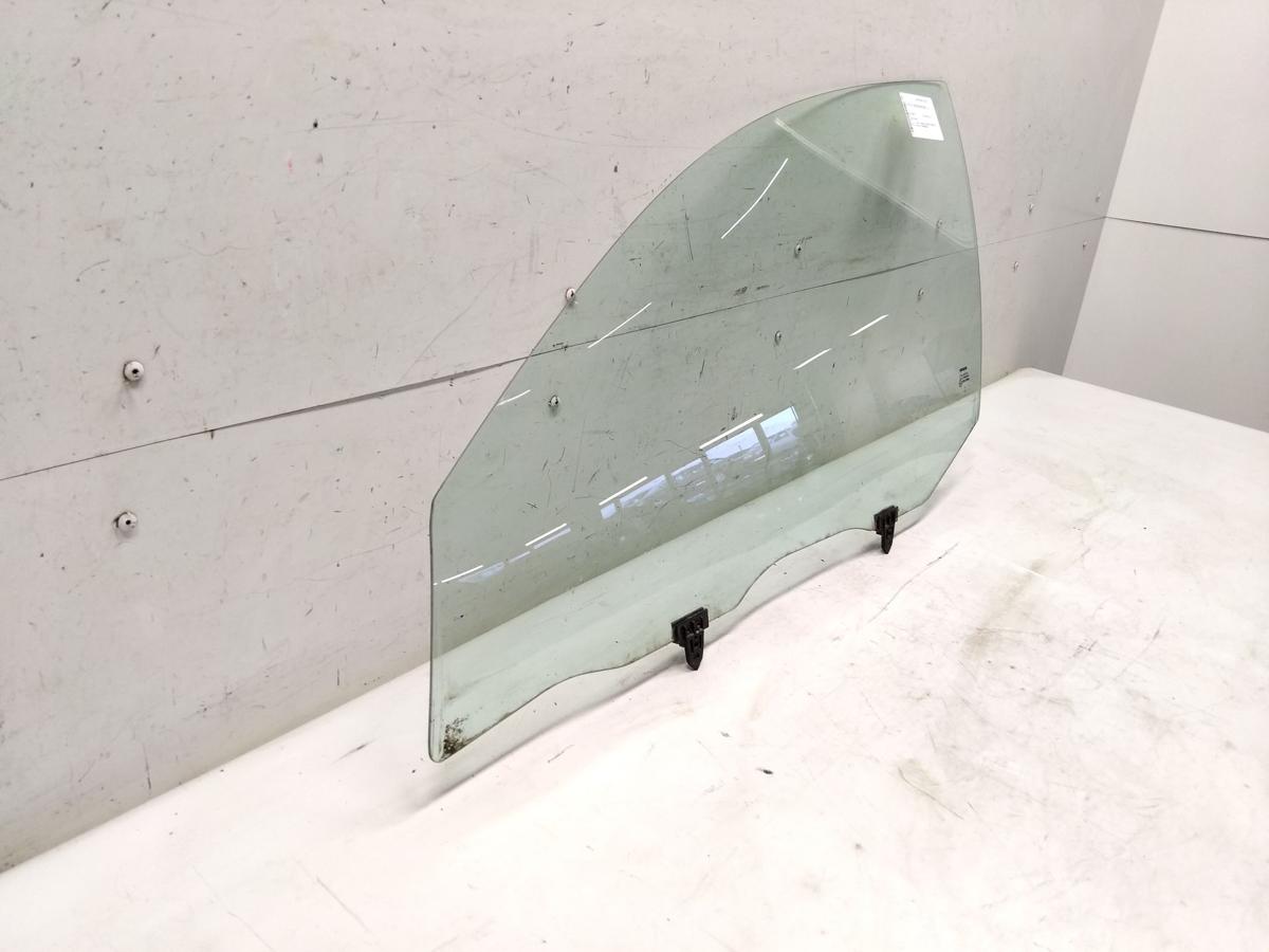 Nissan Primera P12 original T&uuml;rscheibe vorn links gr&uuml;ncolor BJ2002