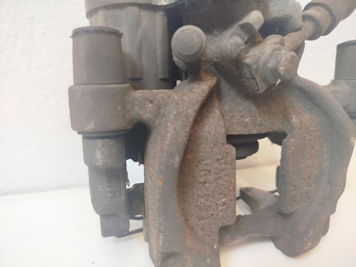 VW Golf Sportsvan AUV Bremssattel hinten rechts Bremszange elekt Parkbremse 272