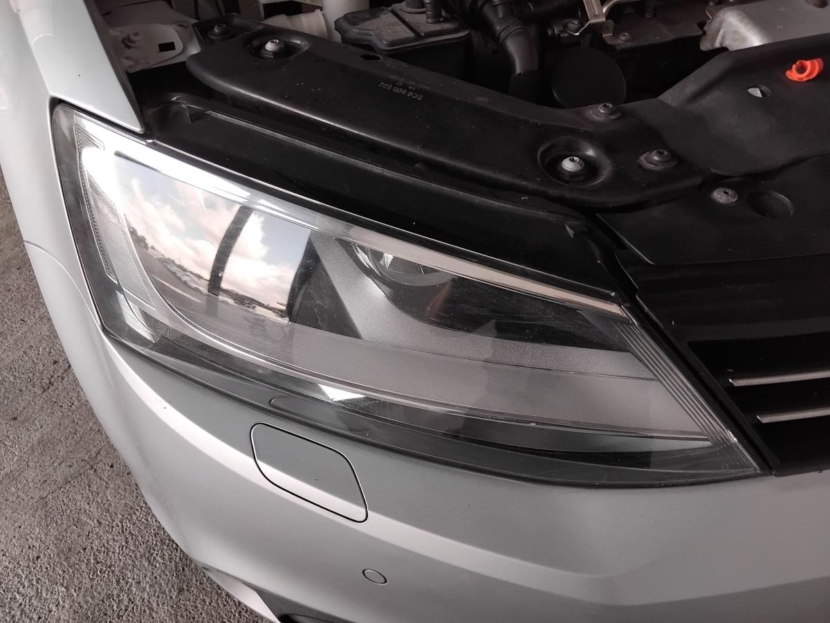 VW Jetta VI 162 original Scheinwerfer rechts Hella Halogen mit LWR BJ2012