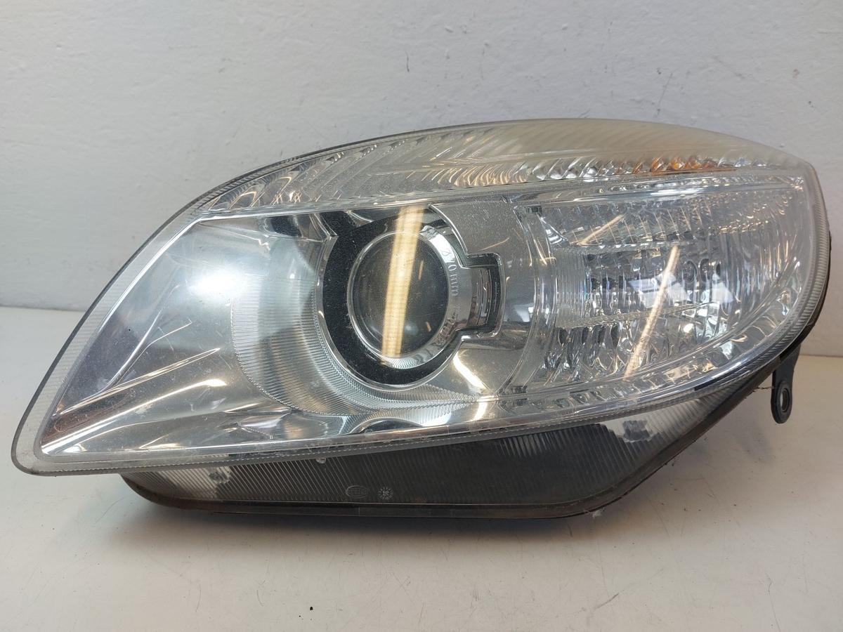 Skoda Fabia 5J Scheinwerfer links Hauptscheinwerfer Bi-Halogen Hella OEM bis 10