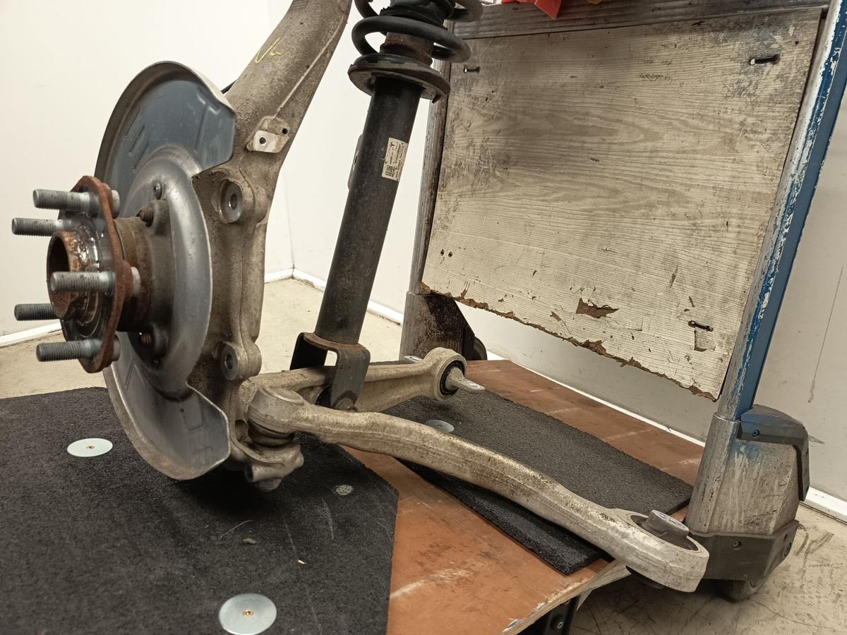 Tesla Model 3 original Federbein komplett 104432100J vorne links Baujahr 2021