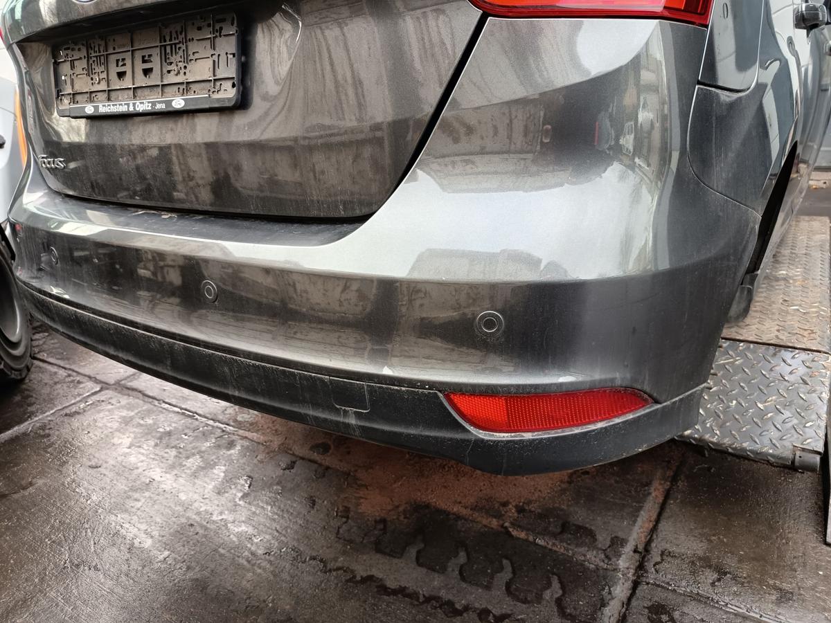 Ford Focus III Limo orig Sto&szlig;stange hinten Magnetic Grau Facelift PDC Bj 2015