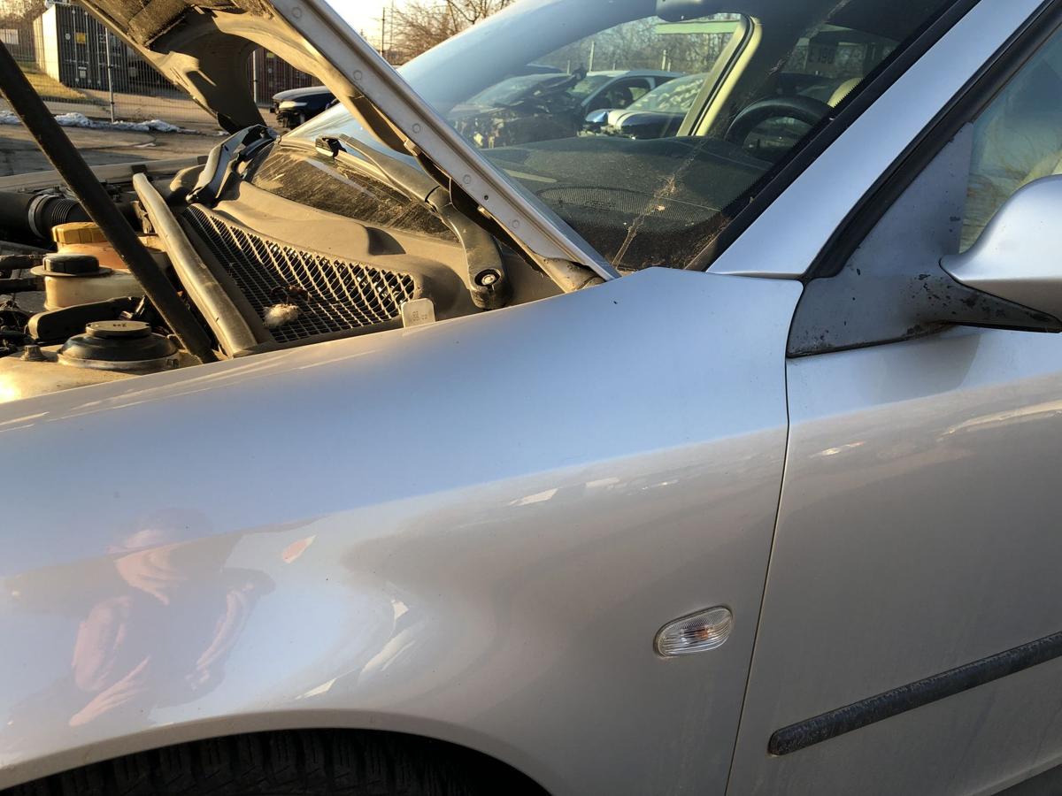 Saab 9-3 Typ YS3F Kotfl&uuml;gel links Fender Radabdeckung silber