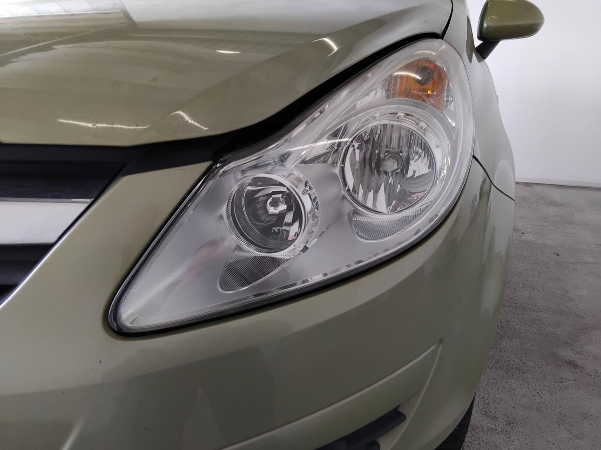 Opel Corsa D original Scheinwerfer links chrom Halogen mit LWR BJ2006