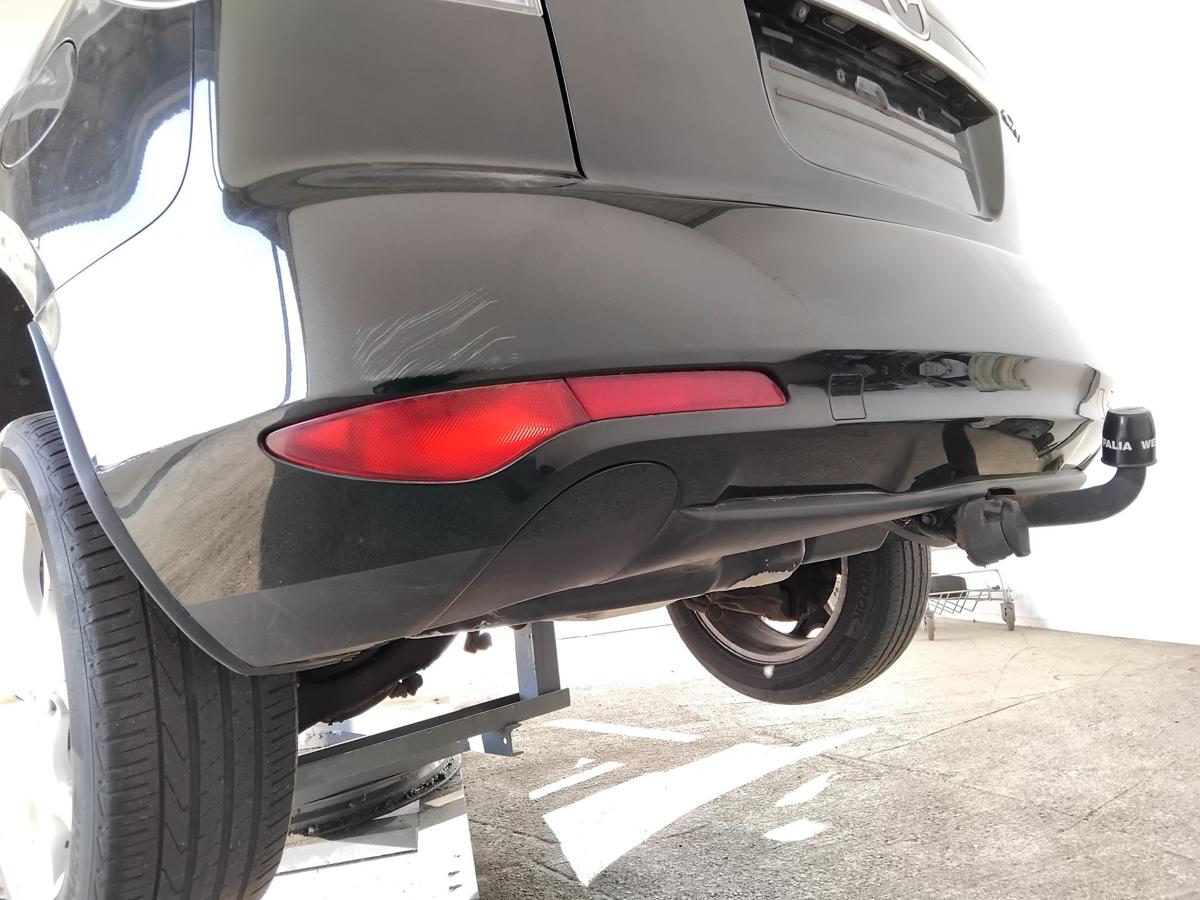 Mazda CX-7 ER Facelift original Stossf&auml;nger Sto&szlig;stange hinten schwarzmet. BJ2010