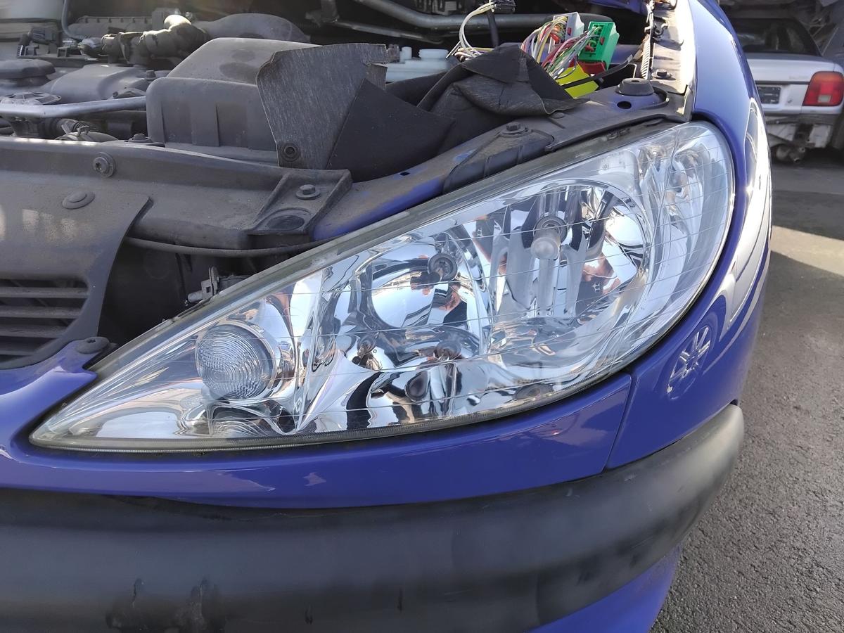 Peugeot 206 original Scheinwerfer vorn links Facelift Halogen mit LWR BJ2005
