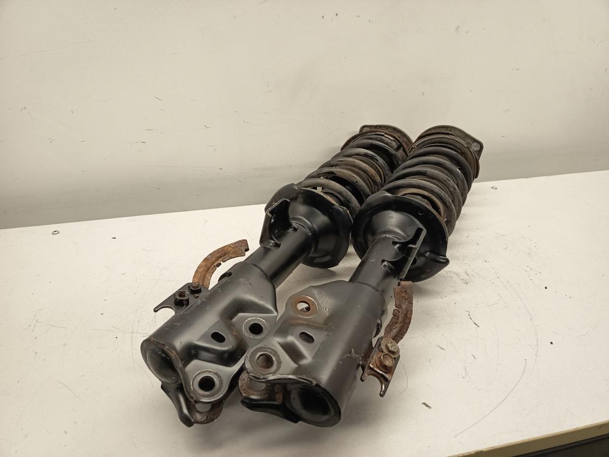 Daihatsu Cuore orig Federbeine vorne 1.0 51kW Baujahr 2009