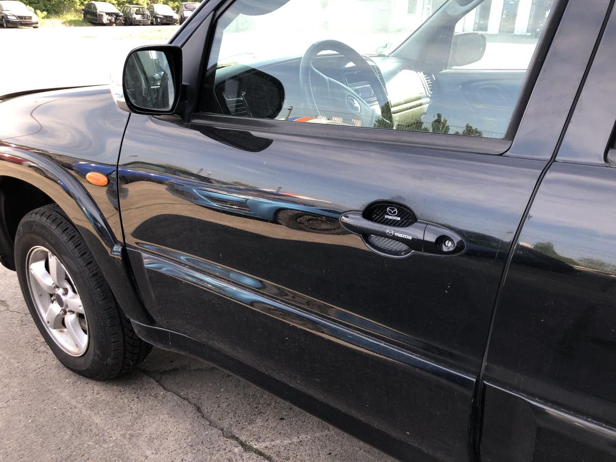 Mazda Tribute EP ab 2004 Tür vorn links Fahrertür im Rohbau schwarz Anrostungen