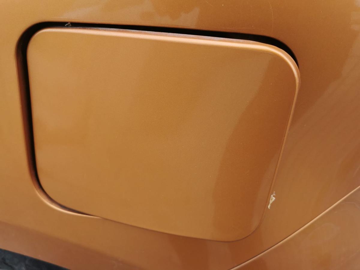 Nissan Micra K13 Tankklappe Tankdeckel Tankverschluss A55 Orange Perl