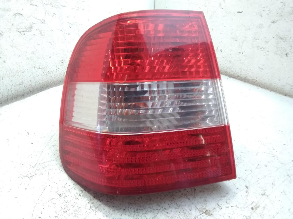 VW Polo 9N2 orig R&uuml;ckleuchte Heckleuchte links au&szlig;en 4-t&uuml;rig Stufenheck BJ2004