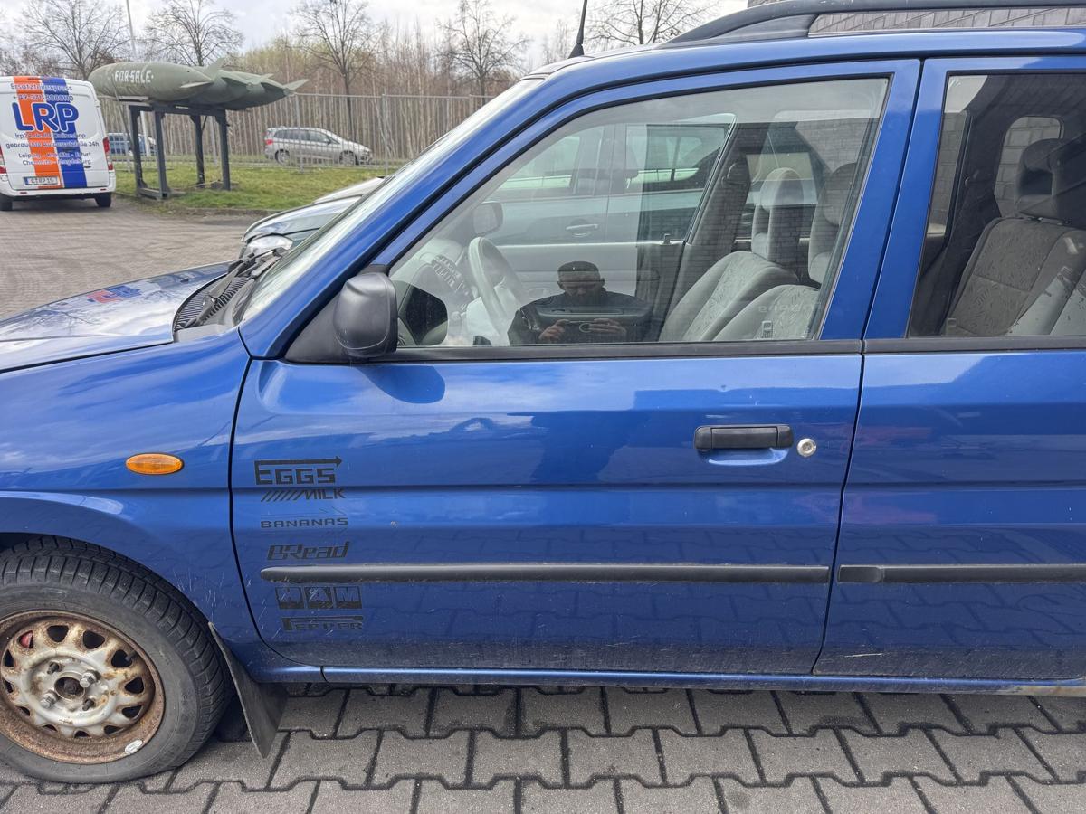 Mazda Demio original T&uuml;r vorn links 20P Innocent Blue Pearl Rohbau Bj.2000