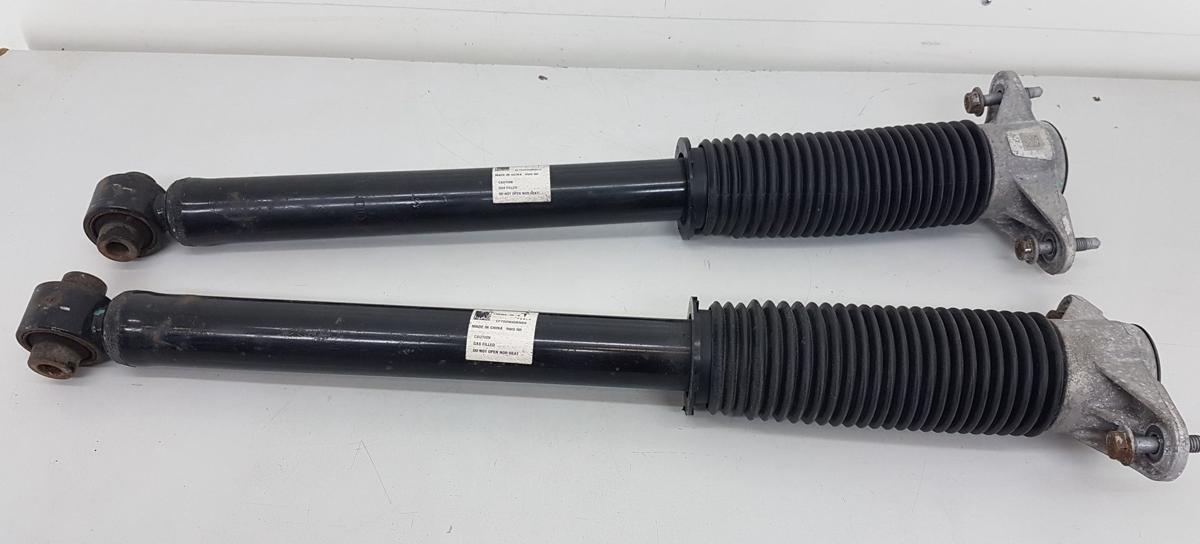 Tesla Model Y Sto&szlig;d&auml;mpfersatz hinten Satz Sto&szlig;d&auml;mpfer Bj2022 1188464-00-B