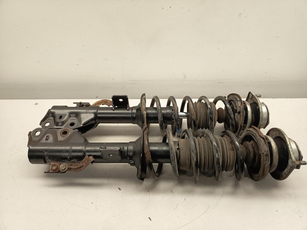 Daihatsu Cuore orig Federbeine vorne 1.0 51kW Baujahr 2009