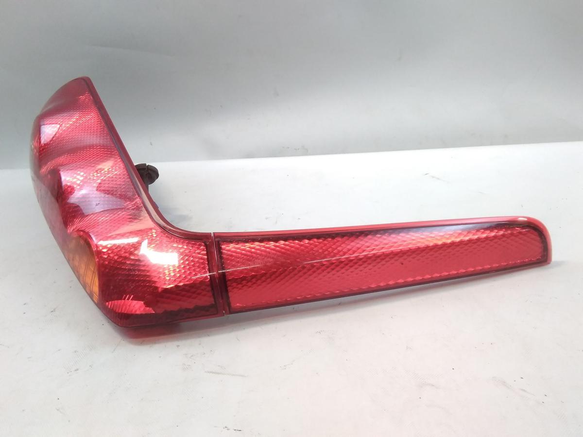 Nissan Note E11 original R&uuml;ckleuchte Heckleuchte links mit Blende oben BJ2006