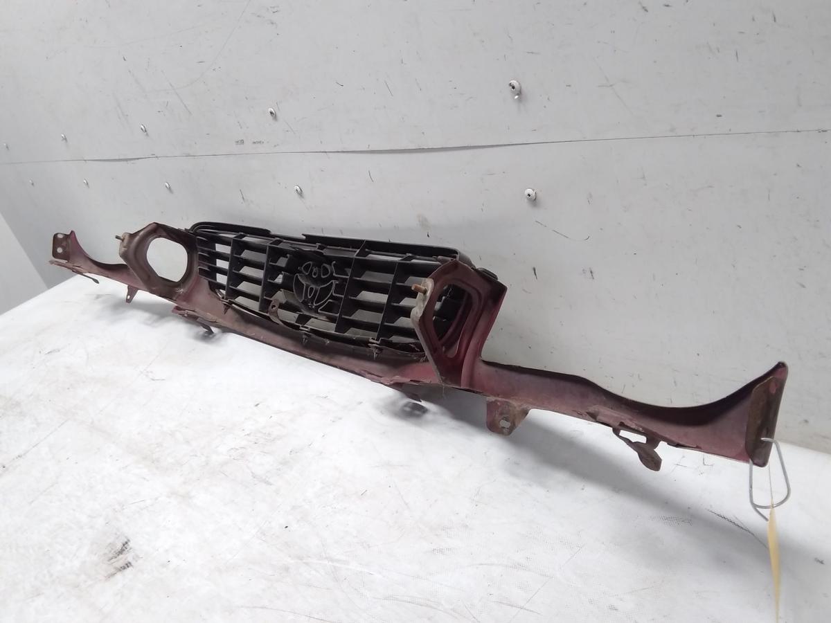 Toyota Corolla E11 Facelift original Kühlergrill mit Leiste unten BJ2001 3N8 Red Pearl