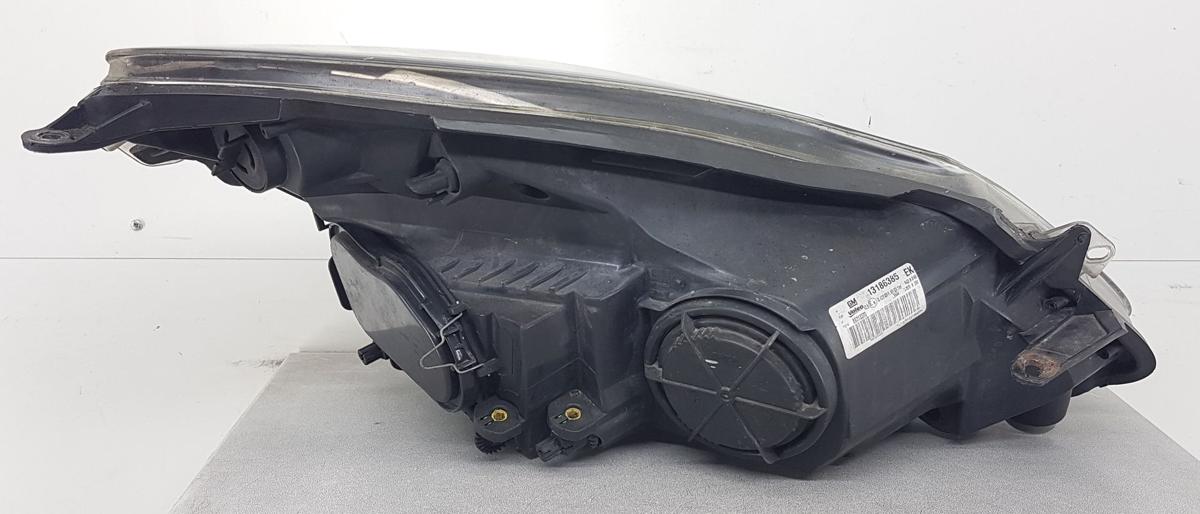 Opel Corsa D Hauptscheinwerfer Frontscheinwerfer links 13186385 Kurvenlicht Bj08