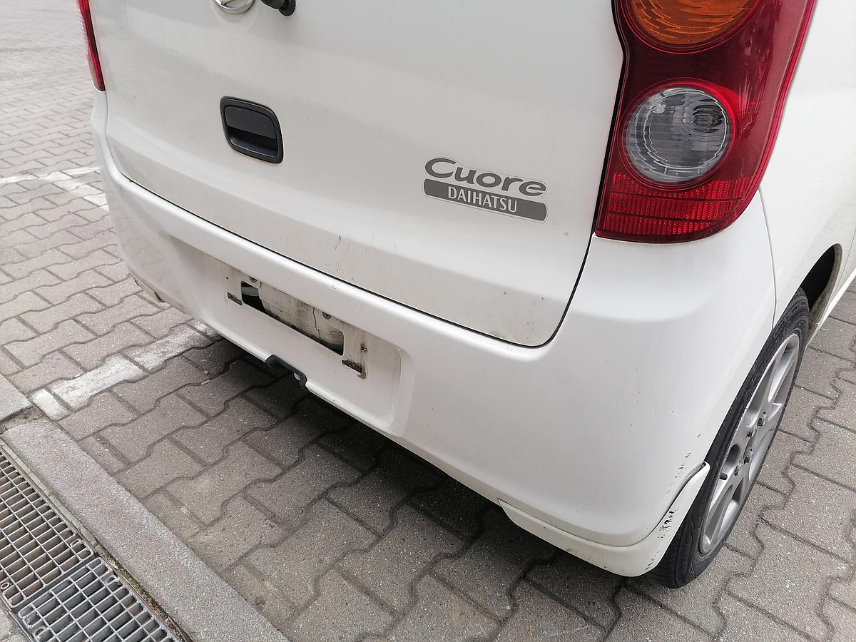 Daihatsu Cuore Stoßfänger Stoßstange hinten W23 White Uni BJ07-12