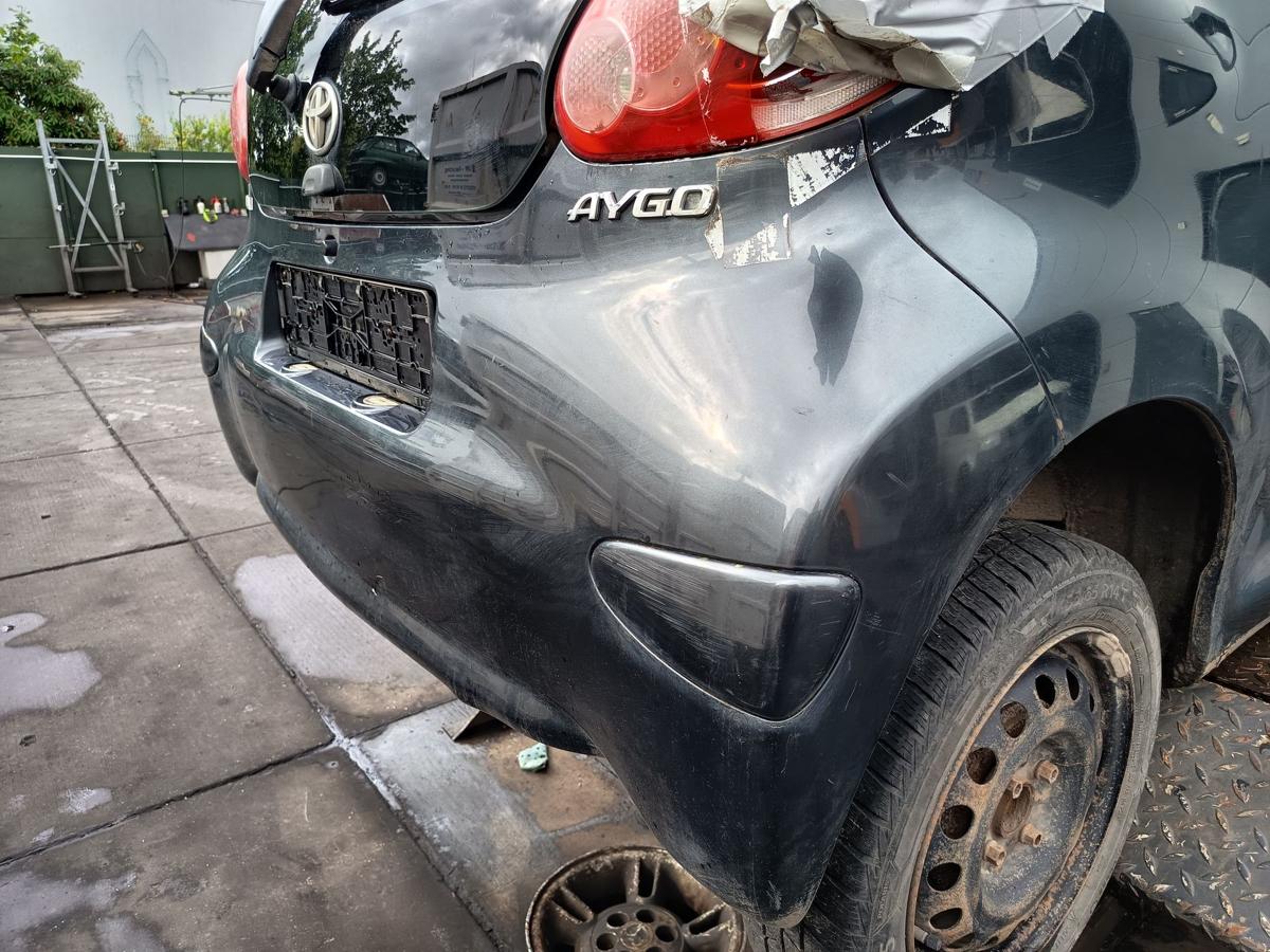 Toyota Aygo I original Sto&szlig;stange F&auml;nger hinten Heck 1E0 Rauchgrau Bj 2005