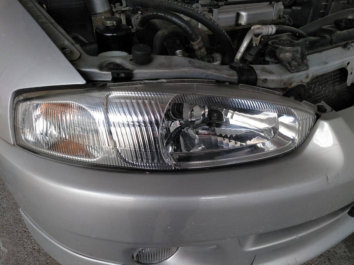 Mitsubishi Colt CJ0 Facelift original Scheinwerfer rechts mit LWR Bj.1999