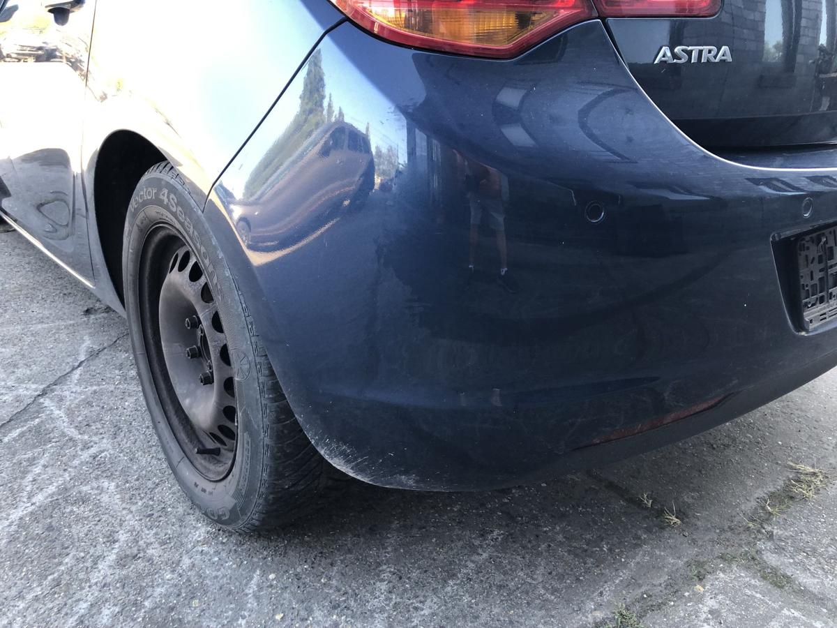 Opel Astra J Stoßfänger hinten Heckschürze mit PDC 5 türer Z22A Waterworld Met