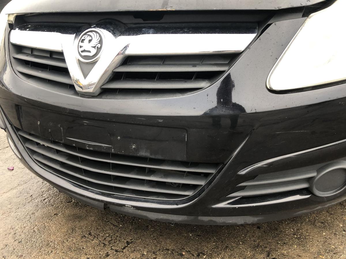 Opel Corsa D Sto&szlig;f&auml;nger vorn Frontsch&uuml;rze mit Vauxhall Grill 2HU Saphirschwarz