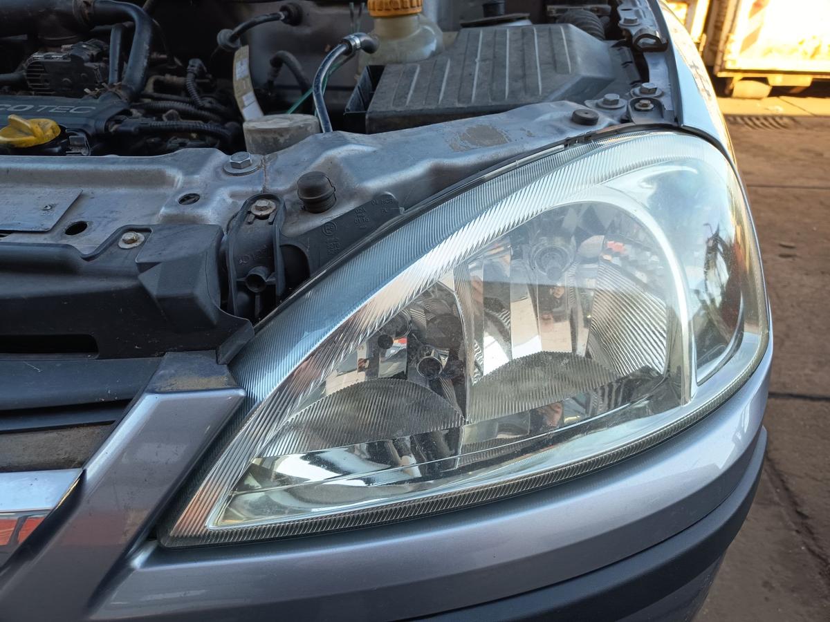 Opel Corsa C original Scheinwerfer links Halogen Haupt Licht Front Bj 2004
