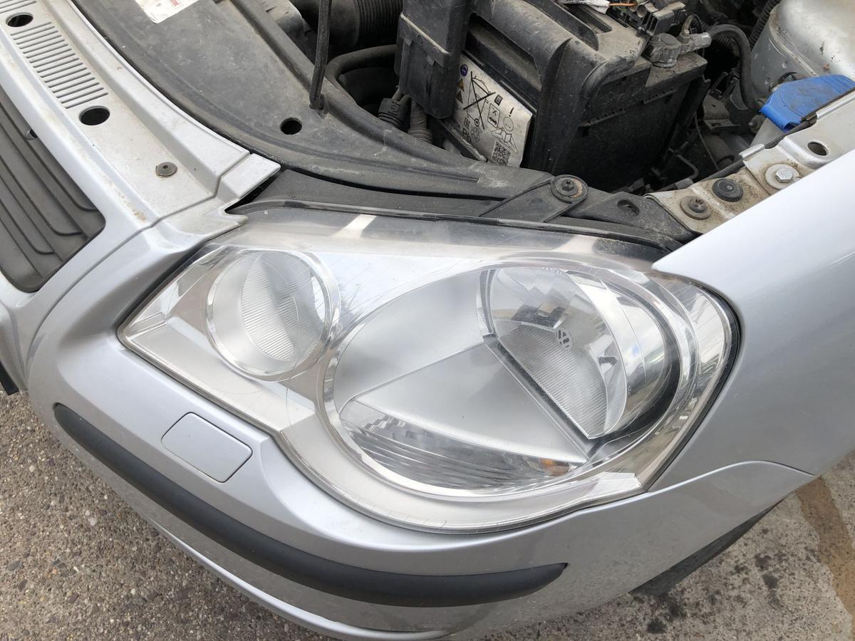VW Polo 9N3 Scheinwerfer links Hauptscheinwerfer Halogen Hella OEM