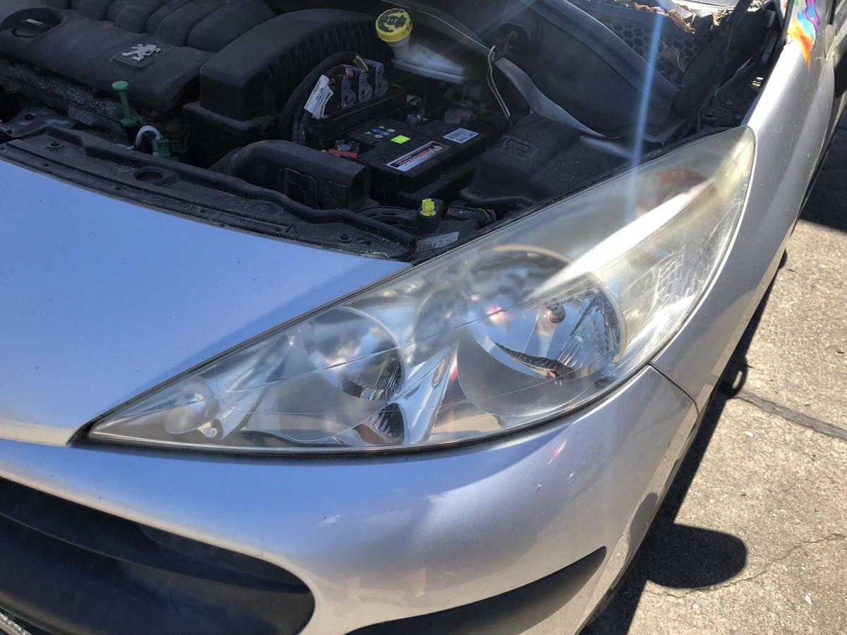 Peugeot 207 WA WC Scheinwerfer links Hauptscheinwerfer Halogen Valeo Tr&uuml;b OEM