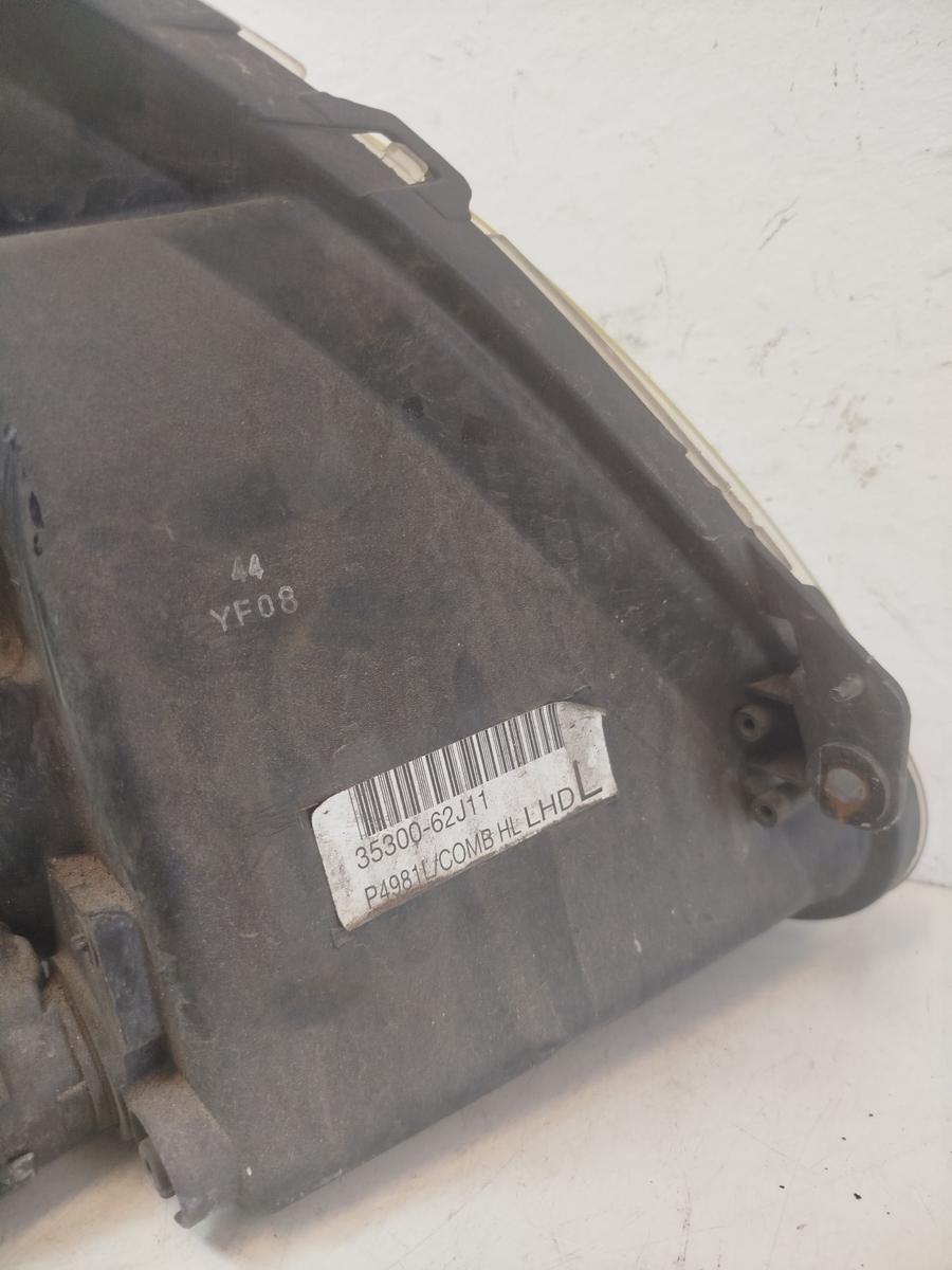 Suzuki Swift Typ MZ/ EZ Scheinwerfer links Hauptscheinwerfer Halogen Tr&uuml;b OEM