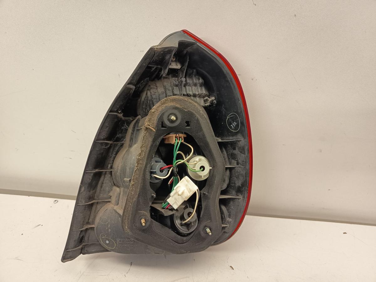 Toyota Corolla E11 3trg orig R&uuml;ckleuchte links Heck Schluss Licht Fahrer Bj 1998