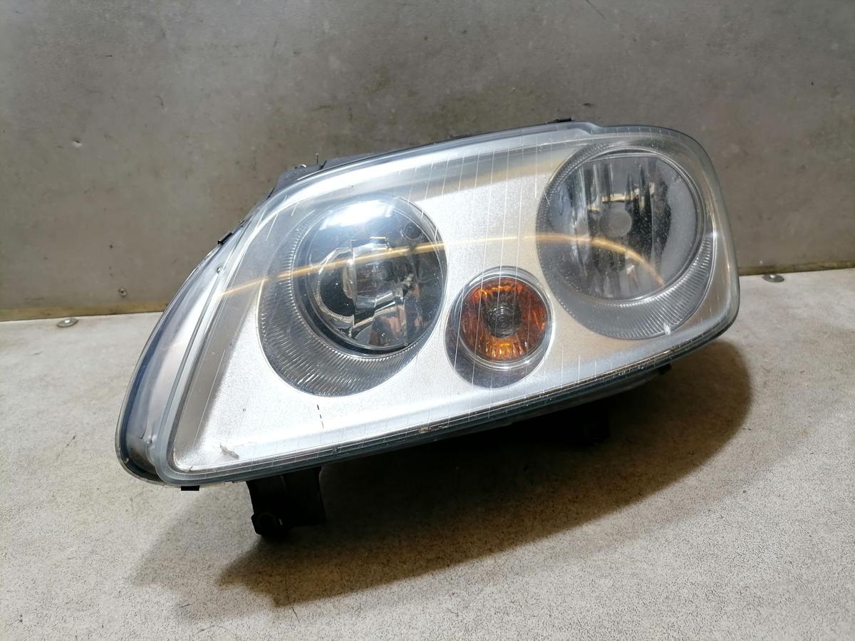 VW Caddy 2K original Scheinwerfer vorn links Halogen mit LWR Bj.2006