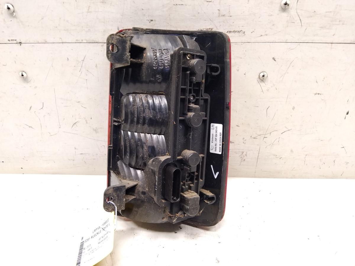 VW Caddy 2K original R&uuml;ckleuchte Schlussleuchte links Heckklappe BJ2005