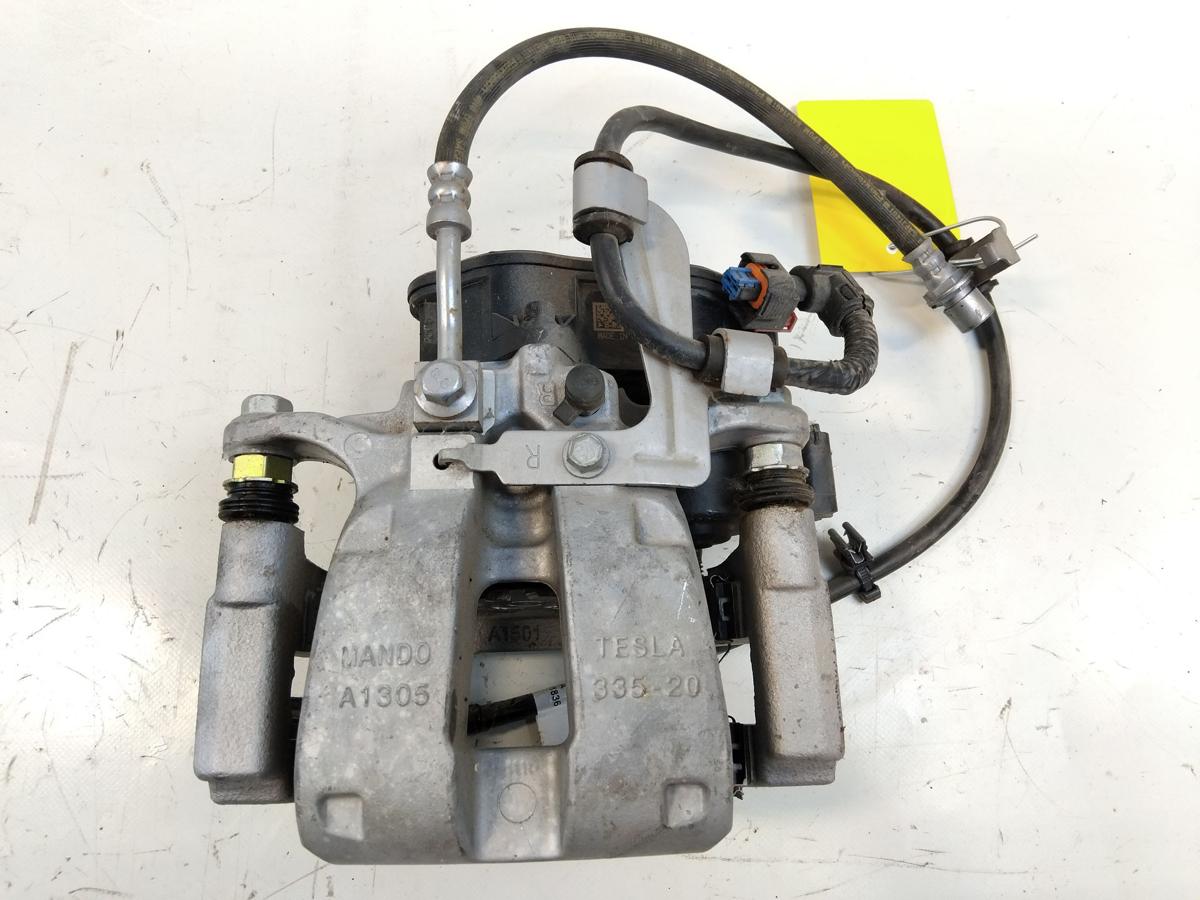 Tesla Model Y original Bremssattel Hinterachse rechts Mando 1044628-00-A Bj.2023