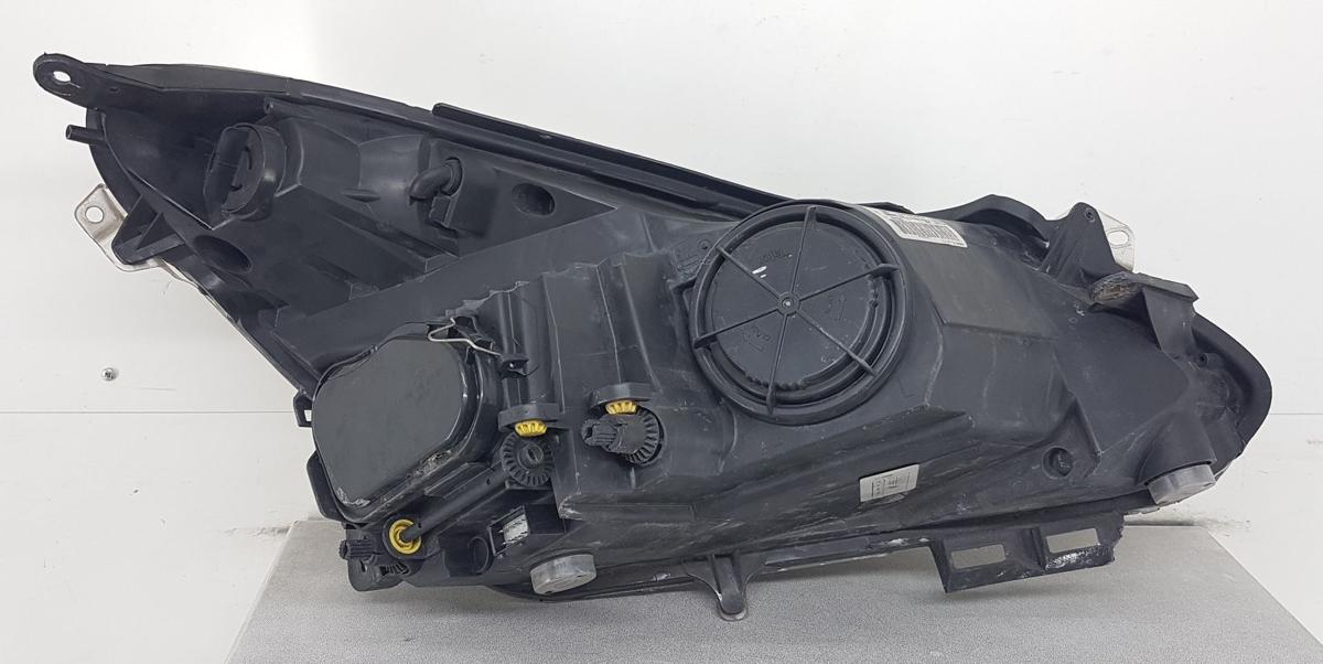 Opel Corsa D Hauptscheinwerfer Frontscheinwerfer links 13186385 Kurvenlicht Bj08