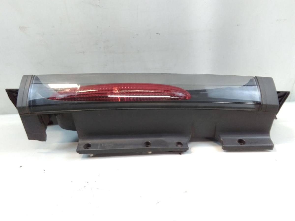 Opel Vivaro A original Rückleuchte Schlussleuchte links mit Blende BJ2003
