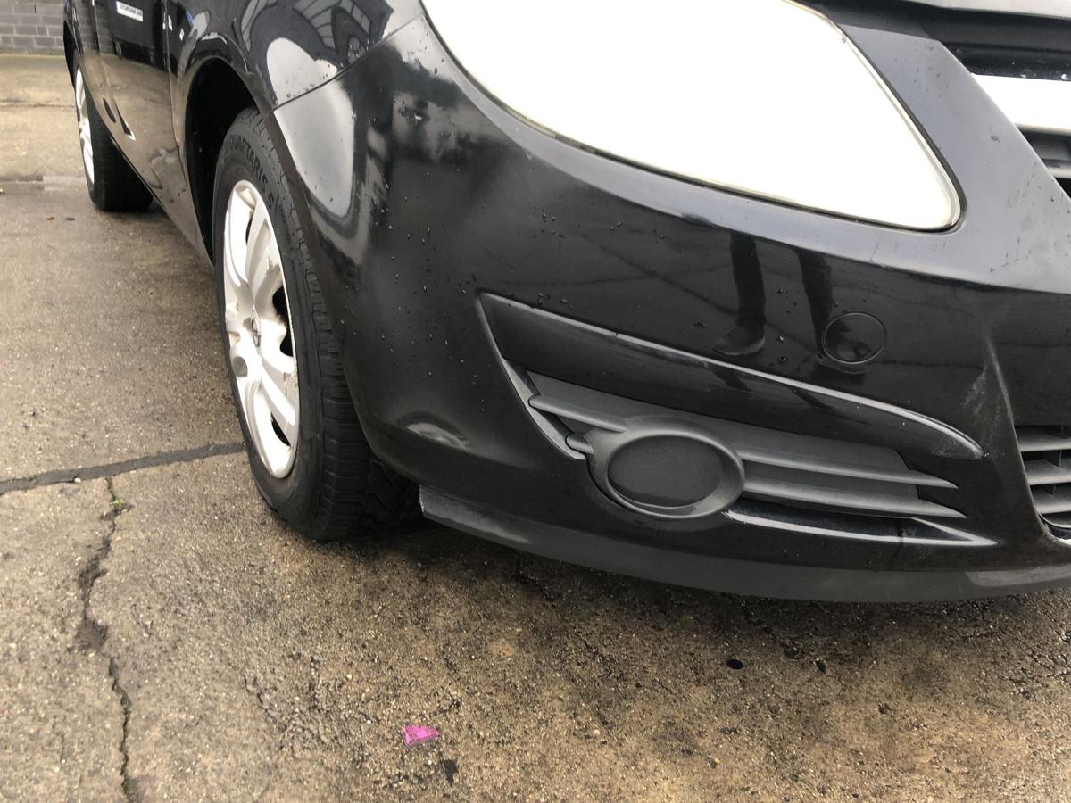 Opel Corsa D Sto&szlig;f&auml;nger vorn Frontsch&uuml;rze mit Vauxhall Grill 2HU Saphirschwarz