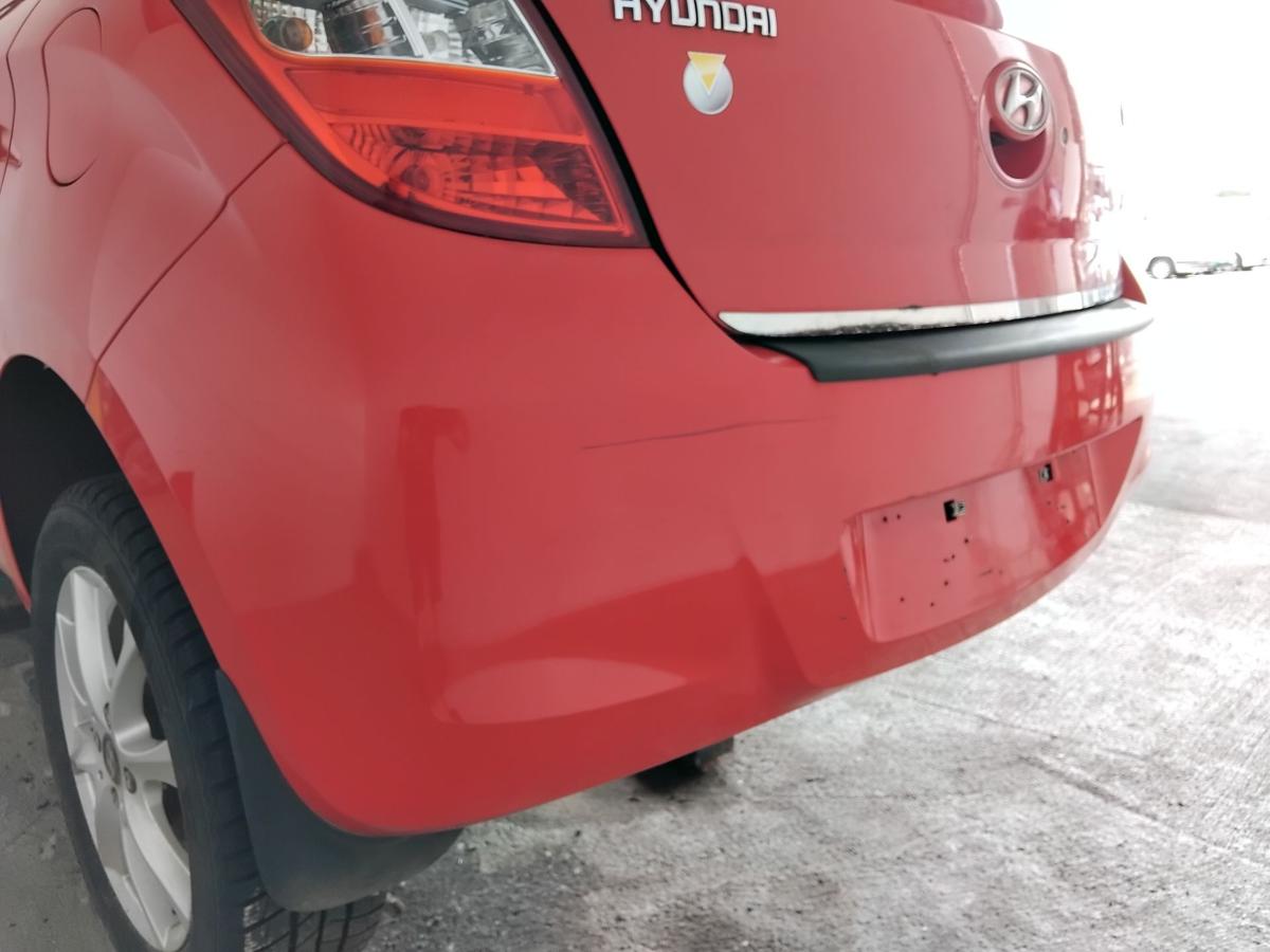 Hyundai i20 PB original Sto&szlig;stange Stossf&auml;nger hinten BH Electric Red BJ2009