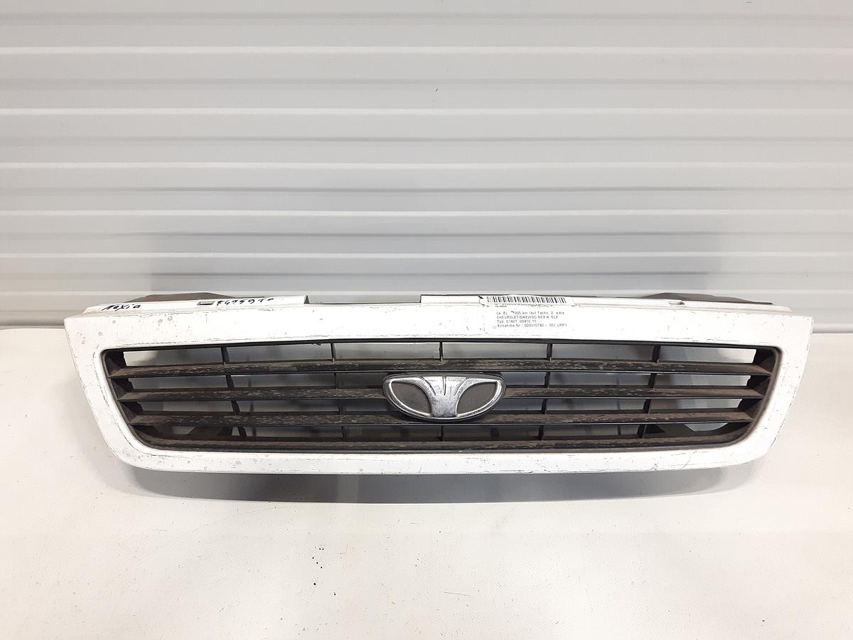 Daewoo Nexia Grill Kühlergrill mit Emblem weiß BJ1995