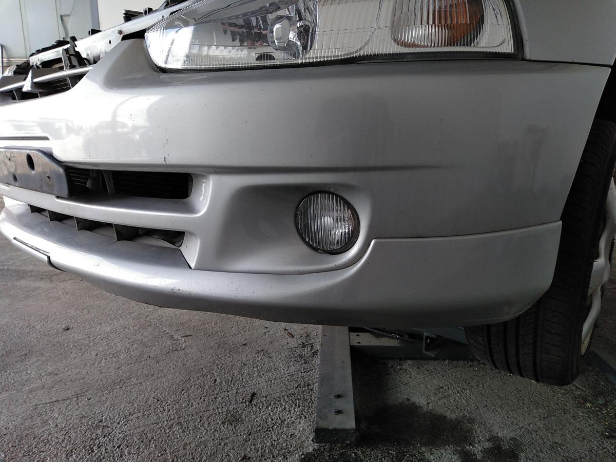 Mitsubishi Colt CJ0 Facelift original Stoßstange Stoßfänger vorn Bj.1999
