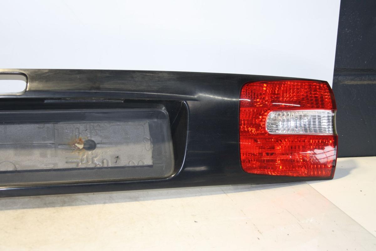 Volvo V40 orig Heckblende Abdeckung Kofferraum Lichtband 347 Titangraumet Bj 03