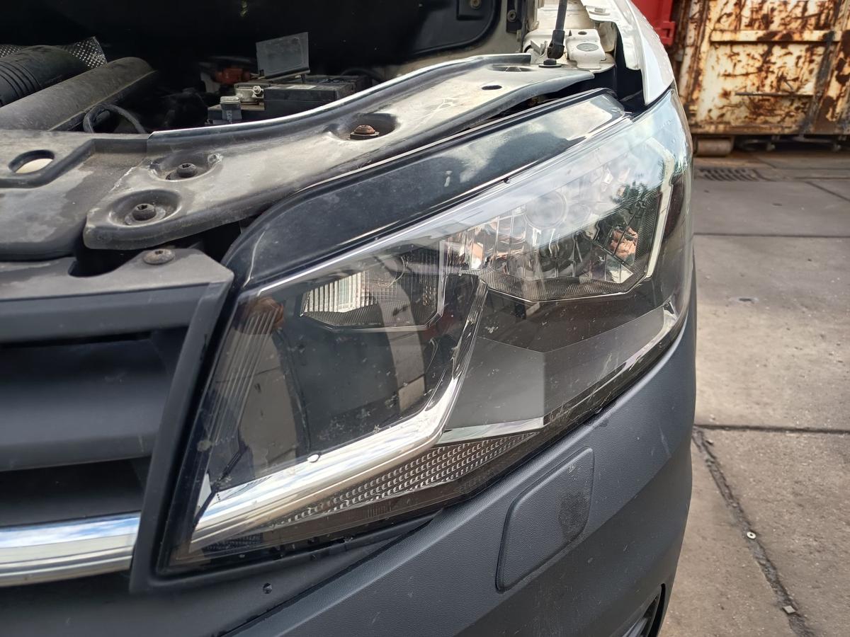 VW Caddy IV SA original Hauptscheinwerfer links Halogen Frontlicht Bj 2016