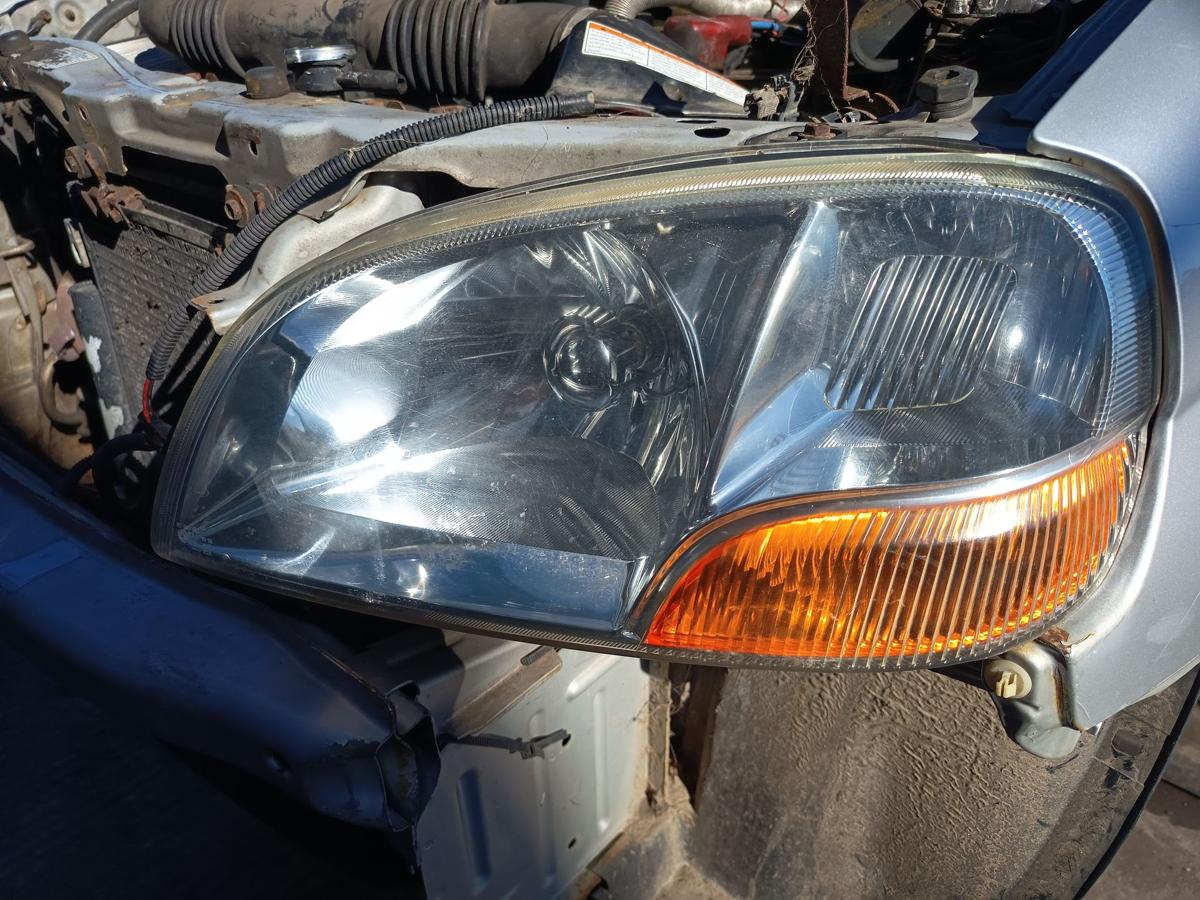 Suzuki Ignis I original Scheinwerfer links Halogen Haupt Licht Front Bj 2001