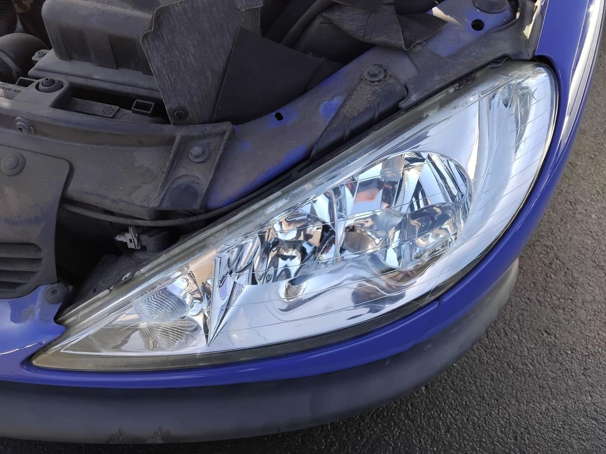 Peugeot 206 original Scheinwerfer vorn links Facelift Halogen mit LWR BJ2005