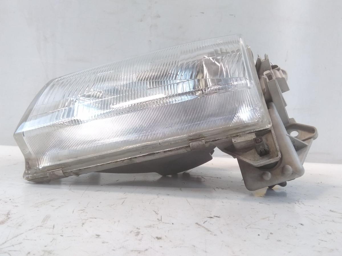 Mazda Demio original Scheinwerfer links Stanley mit LWR BJ1998
