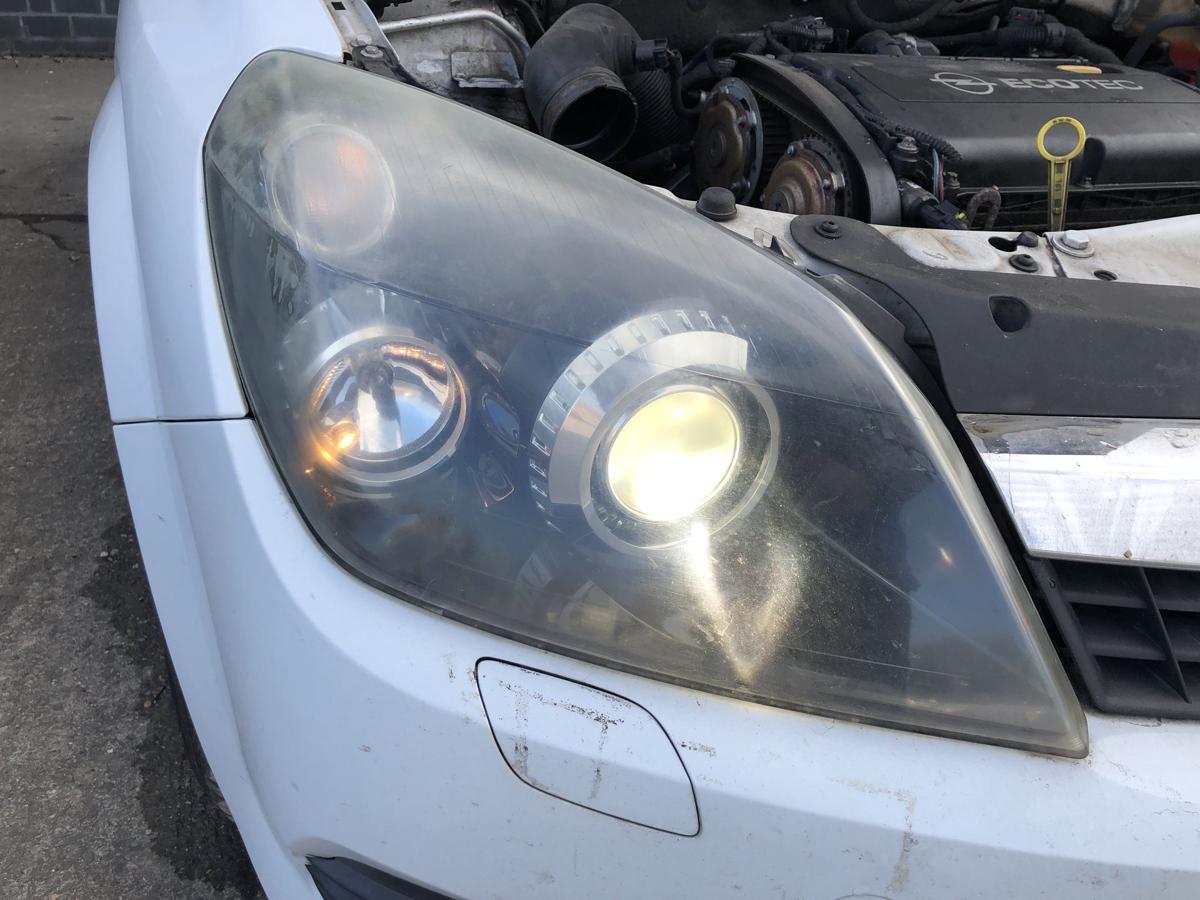 Opel Astra H GTC Scheinwerfer rechts Xenonscheinwerfer Tr&uuml;b OEM Hella Lampe