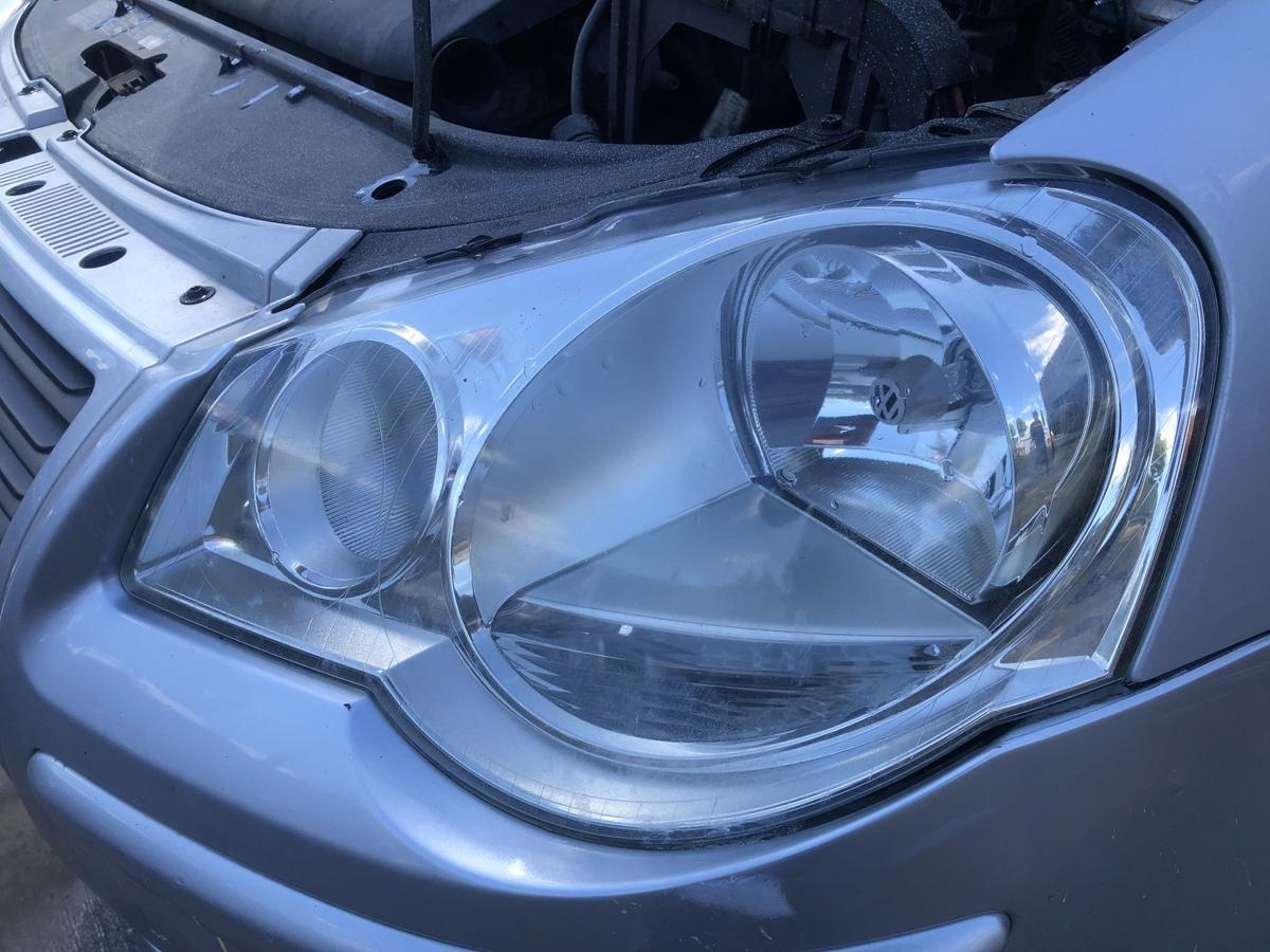 VW Polo 9N3 original Scheinwerfer links Halogen/Haupt/Licht/Front Bj 2005