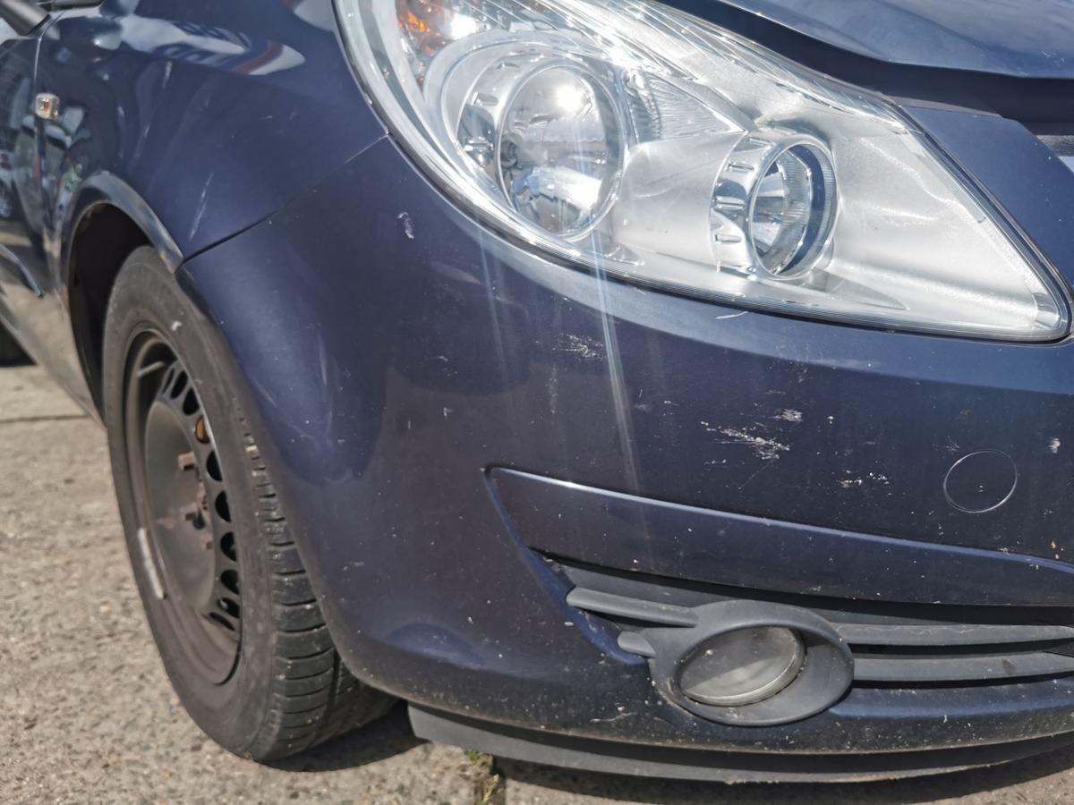 Opel Corsa D Stossfänger Stossstange Bumper vorn NSW Z168 Metroblau Perl