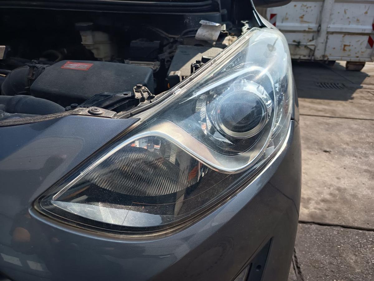 Hyundai i30 GD original Hauptscheinwerfer links Halogen Frontlicht Bj 2013
