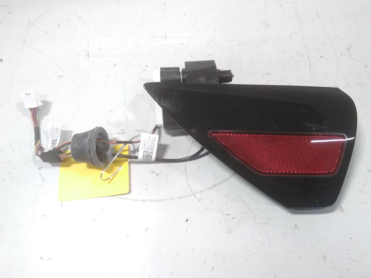 Tesla Model Y original Ladeklappe Blende Reflektor Seitenteil links Bj.2023